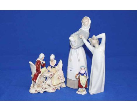 LLADRO FIGURE OF A GIRL AND A LAMB
and a Nao figure of a boy and two others (4)