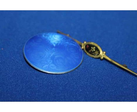 CONTINENTAL SILVER AND ENAMEL CIRCULAR BROOCH 
and a bar brooch with painted floral panel (2) 