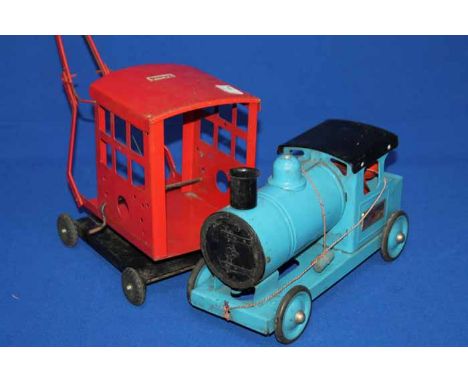 TRI-ANG EXPRESS MODEL TRAIN
together with a Tri-ang model crane and a picnic stove (3)