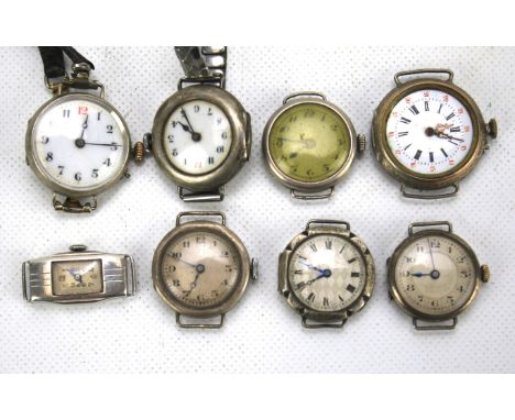 Eight vintage silver and silver plate watch faces. Of assorted designs and sizes, some with enamel and gilt dials