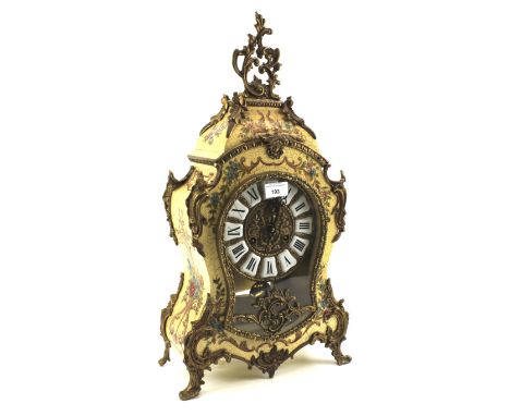 A 20th century Italian mantel clock. With scrolling foliate motifs on a crackle effect cream ground, the dial with Roman nume