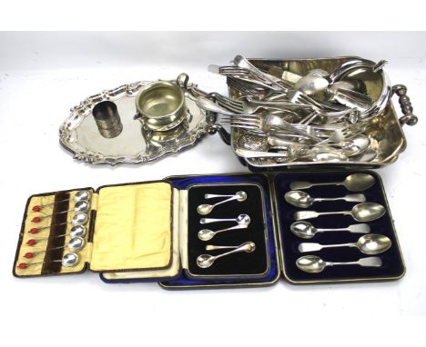 A collection of silver plate. Including three sets of boxed spoons, a tray, flatware, etc