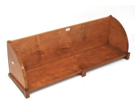 A 20th century stained wooden book trough. L106cm x D31cm x H31cm