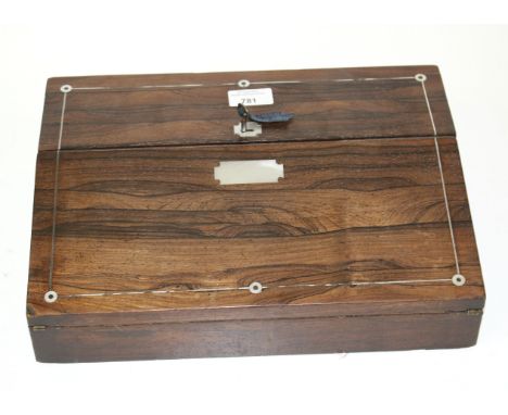 A Victorian rosewood writing slope. Opening to reveal lidded pen compartments and brass topped glass inkwell, with mother of 
