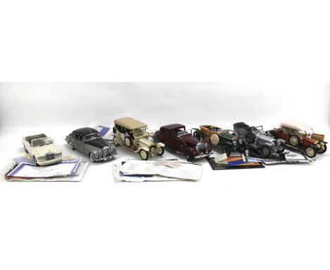 Seven Franklin Mint 1:24 scale Rolls Royce models. To include 1914 Rolls Royce, 1911 Rolls-Royce, 1955 Rolls-Royce Silver Clo