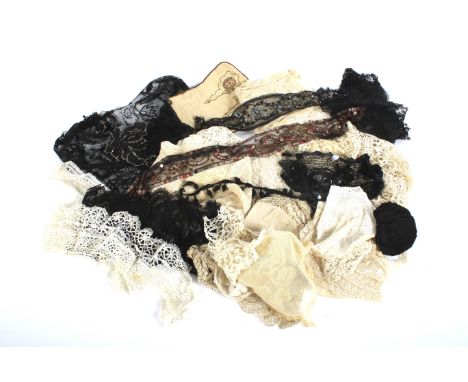 An assortment of 19th century bobbin lace and ladies accessories. Including a length of lace with tambour work depicting flow