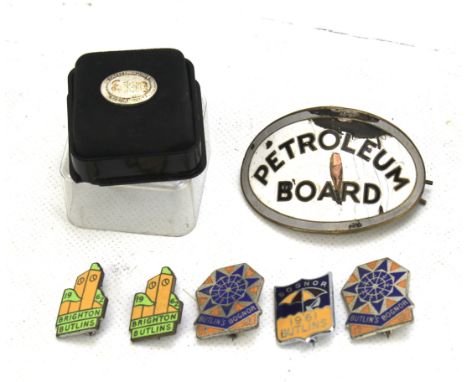 A collection of enamel driving badges. Including one marked 'Petroleum Board'
