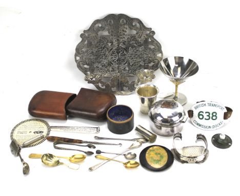 An assortment of collectables. Including flatware, a Stuart Devlin goblet, kettle stand, etc