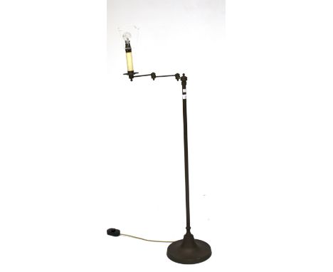 A 20th century metal standard lamp. With articulated arm mechanism, H98cm 