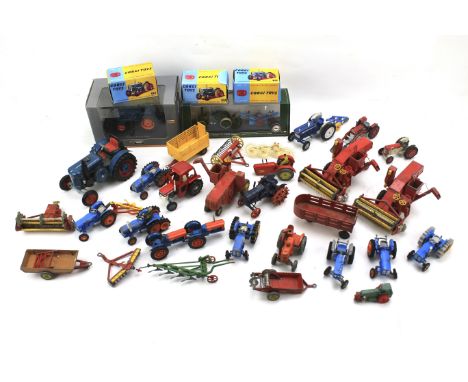 An assortment of diecast and toy tractors. Including a Kovap 1:25 scale tin plate clockwork Lanz Bulldog 4016, Corgi Major 'M