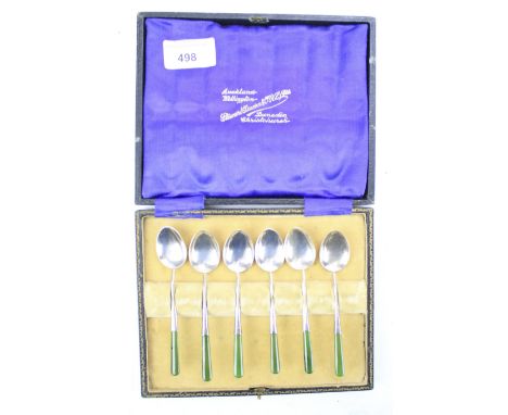 A set of six white metal silver teaspoons. Stamped 'Silver', with jade handles. In a fitted box