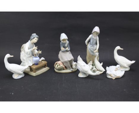 Seven Nao and Lladro figures. Comprising four of swans, an Asian woman and two of women feeding ducks, largest H24cm