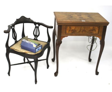 An Art Deco cased sewing machine table and an Edwardian corner chair with lyre splats. The sewing machine marked 319K, housed