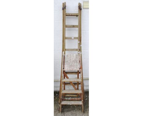 Two vintage wooden ladders. The largest 225cm high (when folded)