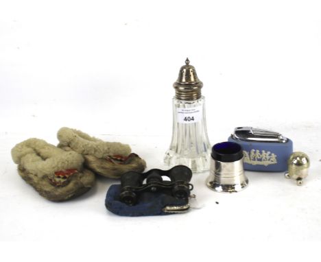 An assortment of collectables. To include a small pair of opera glasses, Art Deco compact set, Inuit style childs shoes, Wedg