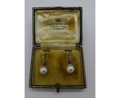 A pair of 9ct white gold and pearl earrings, with screw backs