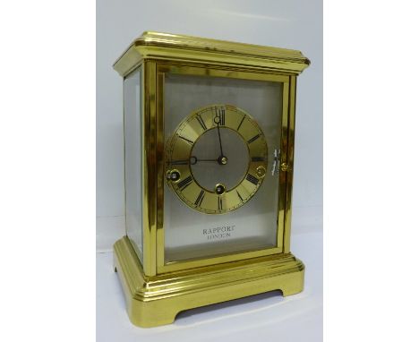 A brass regulator mantel clock, St Michael and Westminster chimes, by Rapport of London, 25cm