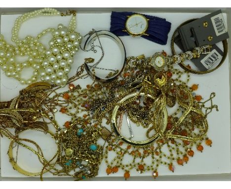 Costume and fashion jewellery including a pair of 9ct gold earrings and a rolled gold bangle