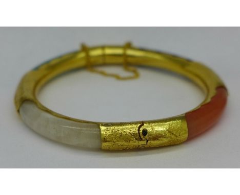 A four colour jade and gilt bangle