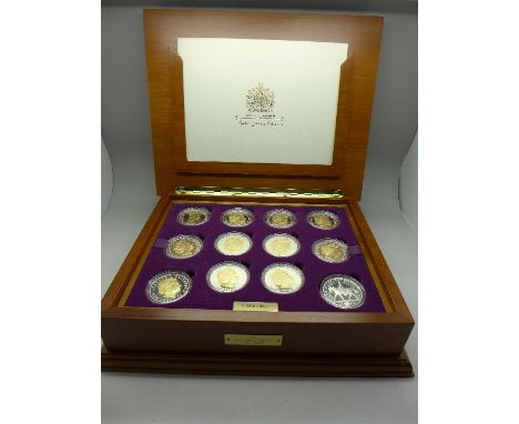 A silver Royal Mint, The Queen's Golden Jubilee twenty-four coin collection, twenty with 22ct gold highlighted portrait with 