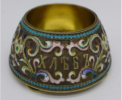 A Russian silver and enamel salt on four feet, marked 84, M.Ovchinnikov in the cyrrillic alphabet, Moscow 1835-1882