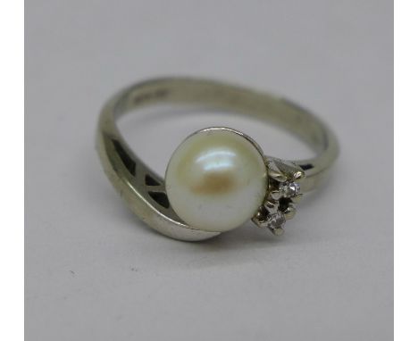 A 10ct white gold, white stone and pearl ring, 2.9g, N