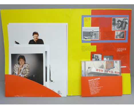 A Paul McCartney Run Devil Run promo CD pack with photographs 