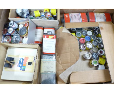 A collection of model paints and a paint pot shaker **PLEASE NOTE THIS LOT IS NOT ELIGIBLE FOR POSTING AND PACKING** 
