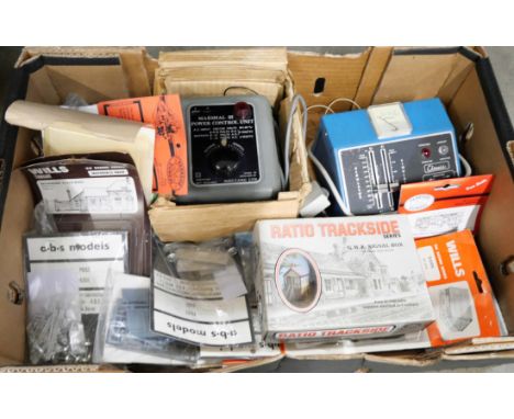 A collection of model train parts, model buildings, coaches, a metal bus (in parts), two control units, etc. **PLEASE NOTE TH