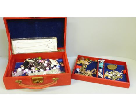 A box of vintage costume jewellery 