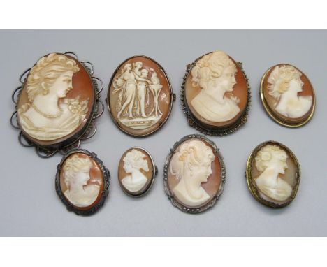 Eight vintage cameos, four with silver mounts 