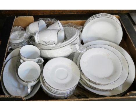 A Noritake Temptation design four setting dinner and tea set **PLEASE NOTE THIS LOT IS NOT ELIGIBLE FOR POSTING AND PACKING**