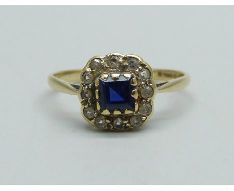 A 9ct gold, paste blue and white stone cluster ring, 1.4g, M 