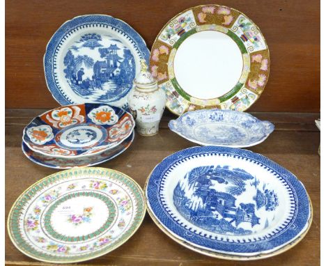 Two Imari plates, a Noritake enamelled plate, a Samson Armorial lidded vase, an Ironstone plate, an oriental pattern plate, a