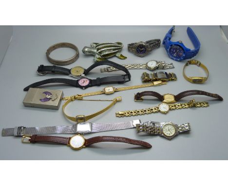 A silver bangle and lady's wristwatches 