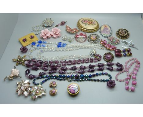 A collection of costume jewellery and a compact, etc. 