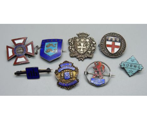 Seven silver and enamel badges including NURWG and one other unmarked badge 