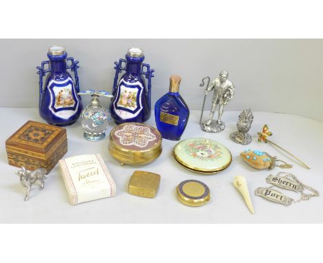 A pair of silver rimmed vases, a silver filled model chicken, compacts and scent bottles 