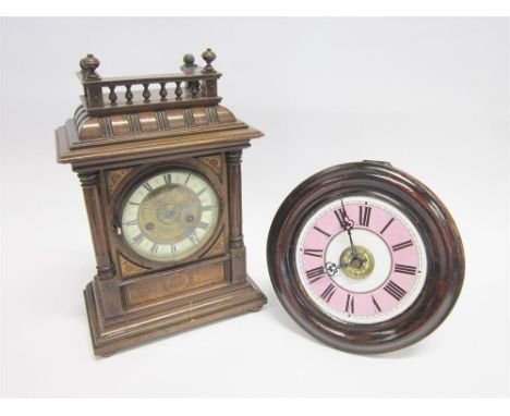 A VICTORIAN BLACK FOREST POSTMAN'S ALARM WALL CLOCK,  twin weight driven movement, the enamelled dial with pink chapter ring 