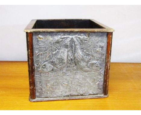 AN ARTS AND CRAFTS PLANTER Plywood frame, with four pewter panels, two decorated with koi carp detail, 20cm high