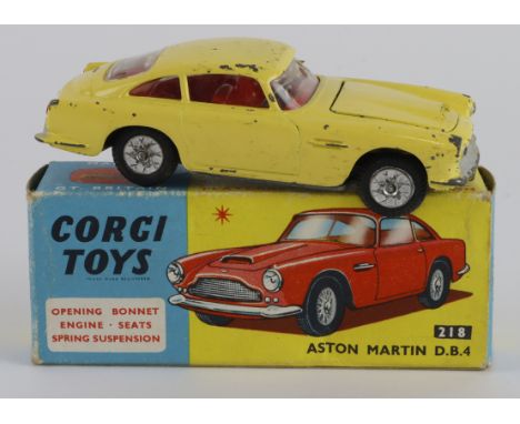 Corgi Toys, no. 218 'Aston Martin DB4' (yellow), contained in original box