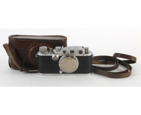 Leica III Rangefinder camera (no. 154465) circa 1935, with Leitz Elmar 1:3,5 f=50mm lens, contained in original Leica leather