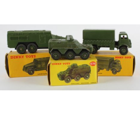Dinky Toys. Three boxed Dinky Military models, comprising no. 623 'Army Covered Wagon'; no. 676 'Armoured Personnel Carrier';