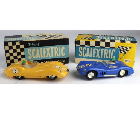 Scalextric. Two boxed Scalextric slot car models, comprising 'Lister Jaguar' (MM/E1, yellow) &amp; 'Aston Martin' (C57, blue)