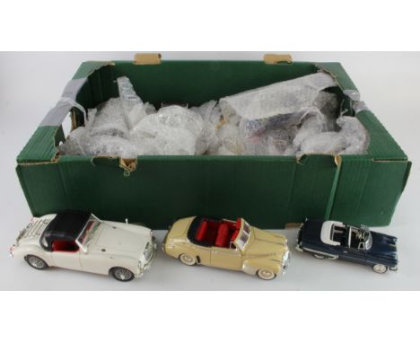 Diecast models. A collection of approximatey thirty diecast model cars, makers include Solido, Welly, Revell, etc.