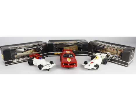 Scalextric. Three boxed Scalextric slot car models, comprising 'BRM P160' (C051, white); 'BMW Turbo 320' (C128, red); 'Marlbo