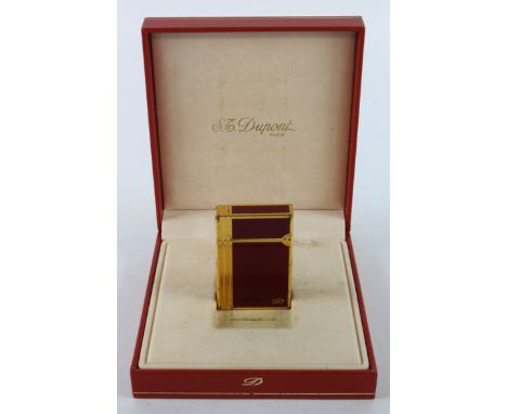 Dupont. An S. T. Dupont red enamel lighter, contained in original fitted box
