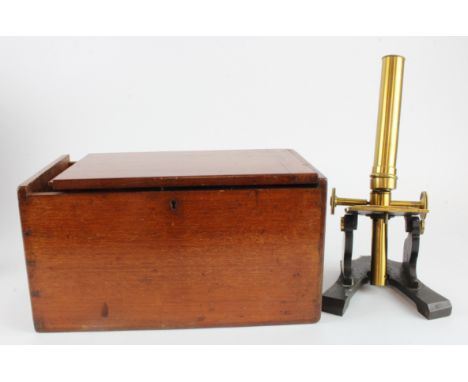 Microscope. A brass and black laquered microscope, by R. Field &amp; Son, Birmingham, with accessories and a small group of s
