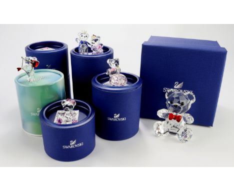 Swarovski. A collection of nine boxed Swarovski crystal 'Kris Bear' ornaments, including 'I Am Big Now', tallest 80mm approx.