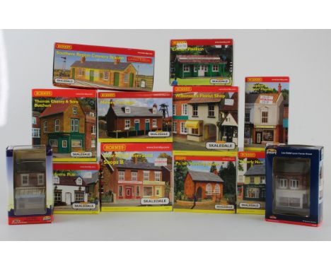 Hornby / Bachmann. A collection of ten Hornby Skaledale &amp; two Bachmann Scenecraft model buildings, including Southern Reg